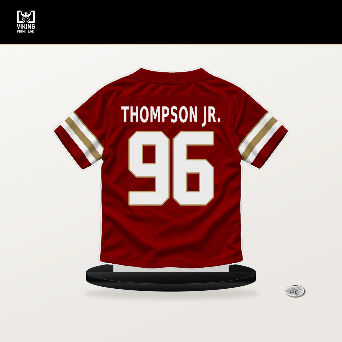 James Thompson Jr. number 96 San Francisco 49ers jersey stand with included black base.