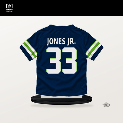Velus Jones Jr. number 33 Seattle Seahawks jersey stand with included black base.