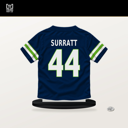 Chazz Surratt number 44 Seattle Seahawks jersey stand with included black base.
