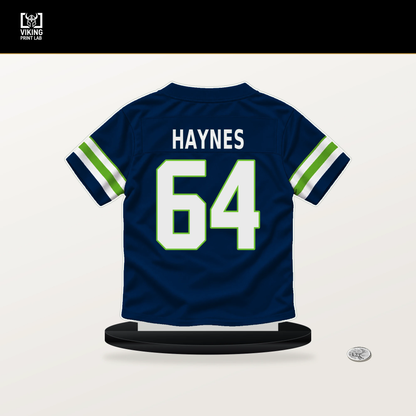 Christian Haynes number 64 Seattle Seahawks jersey stand with included black base.