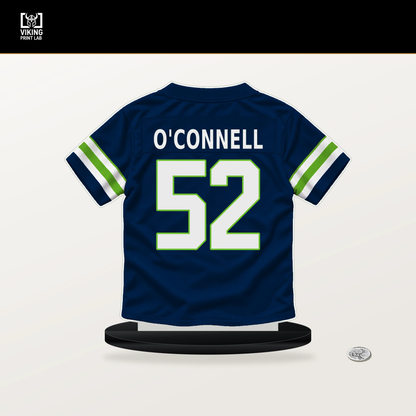Patrick O'Connell number 52 Seattle Seahawks jersey stand with included black base.