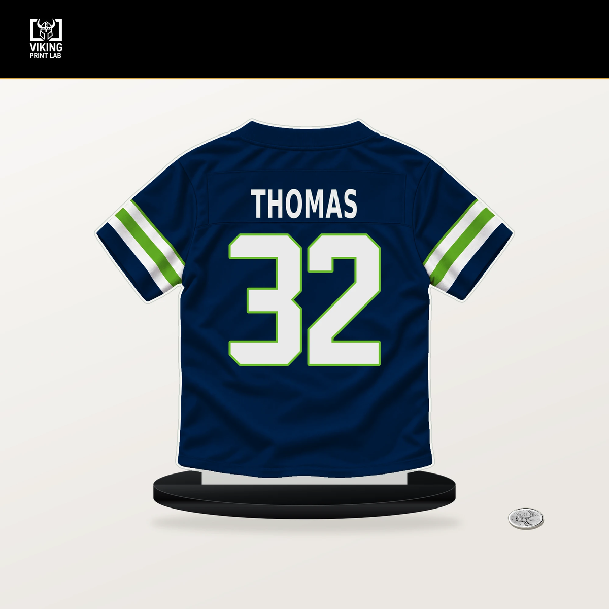 Drake Thomas number 32 Seattle Seahawks jersey stand with included black base.