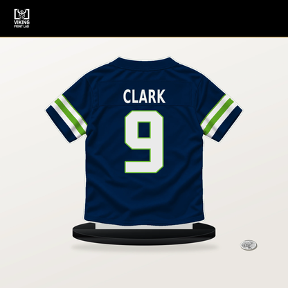 Bud Clark number 9 Seattle Seahawks jersey stand with included black base.