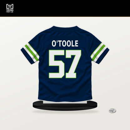 Connor O'Toole number 57 Seattle Seahawks jersey stand with included black base.