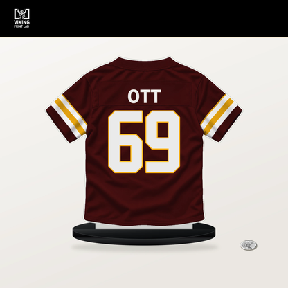 Tyler Ott number 69 Washington Commanders jersey stand with included black base.