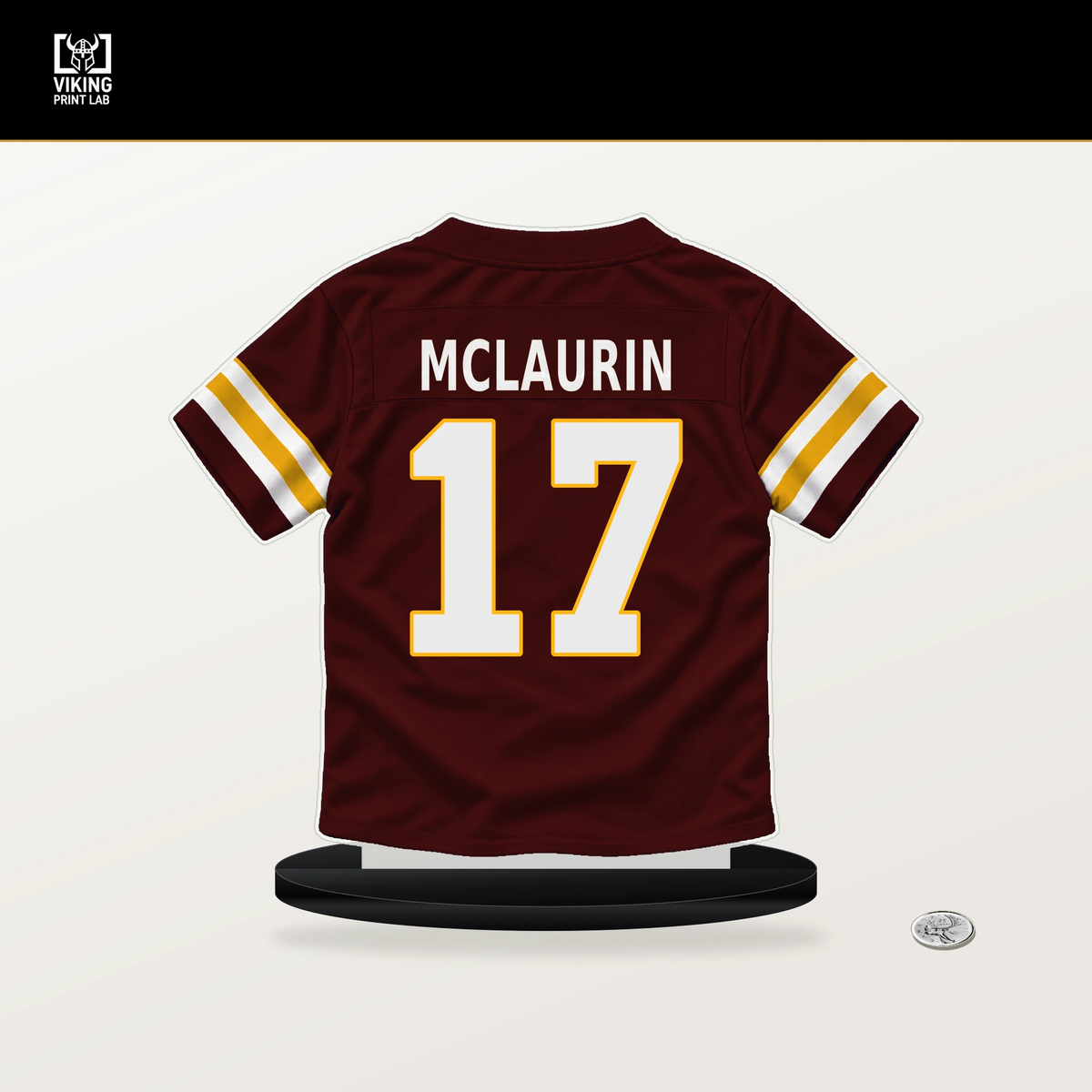 Terry McLaurin number 17 Washington Commanders jersey stand with included black base.