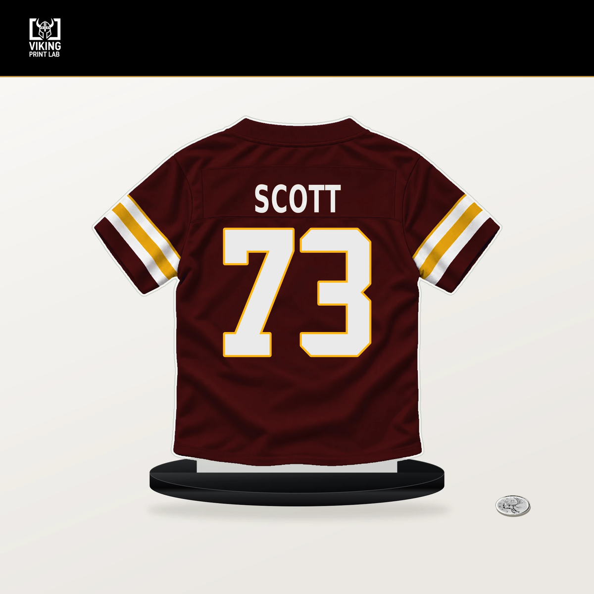 Trent Scott number 73 Washington Commanders jersey stand with included black base.