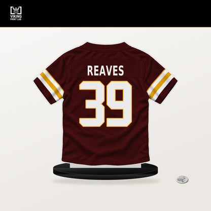 Jeremy Reaves number 39 Washington Commanders jersey stand with included black base.