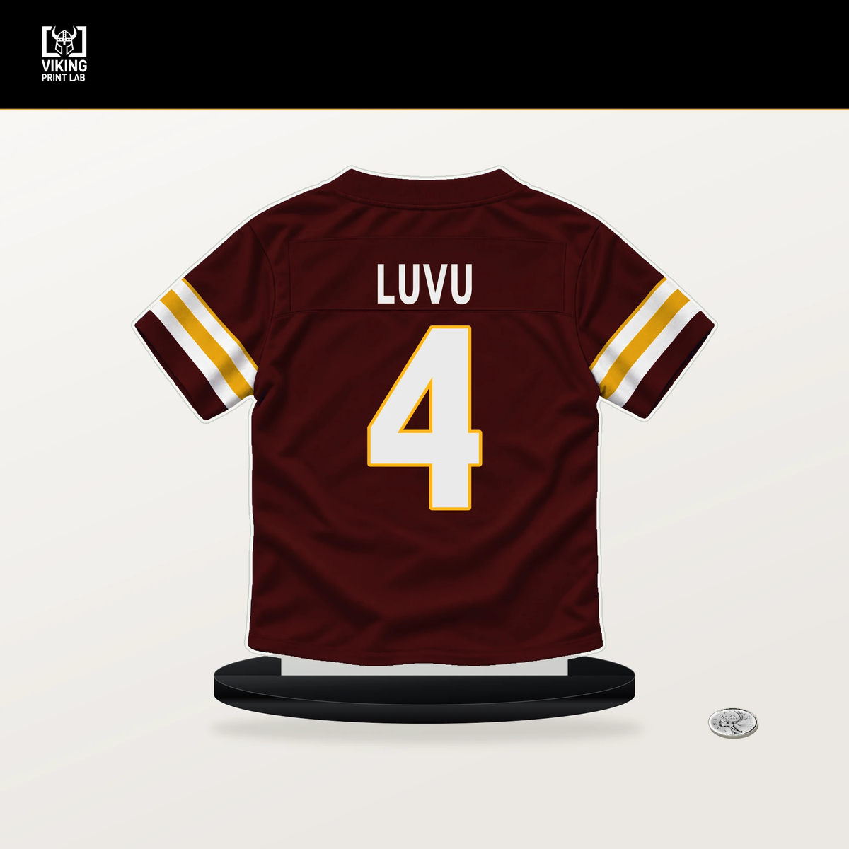 Frankie Luvu number 4 Washington Commanders jersey stand with included black base.