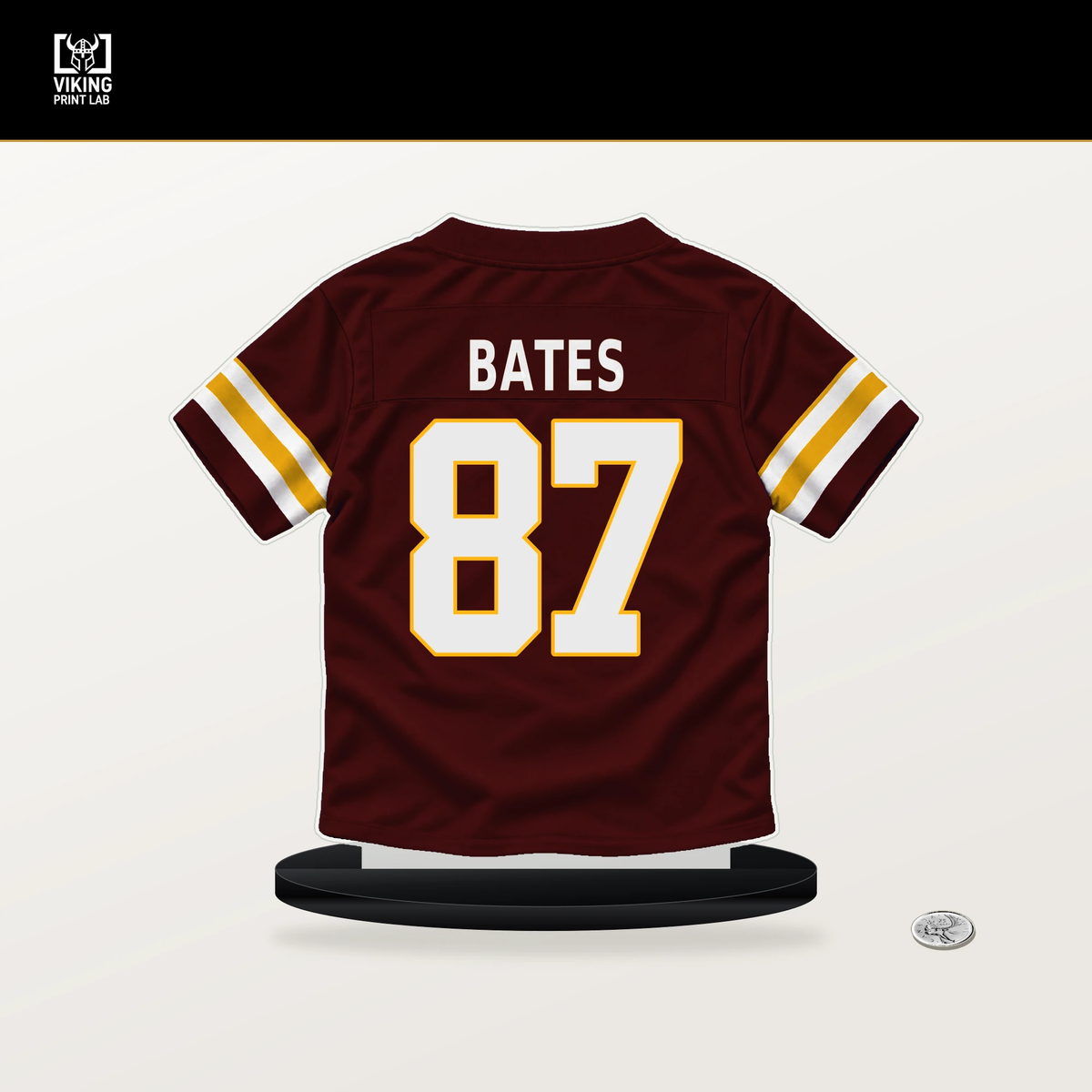 John Bates number 87 Washington Commanders jersey stand with included black base.