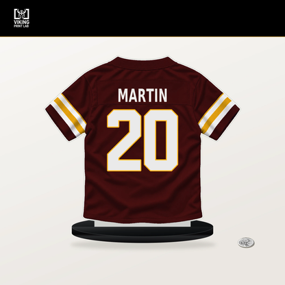 Quan Martin number 20 Washington Commanders jersey stand with included black base.