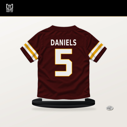 Jayden Daniels number 5 Washington Commanders jersey stand with included black base.
