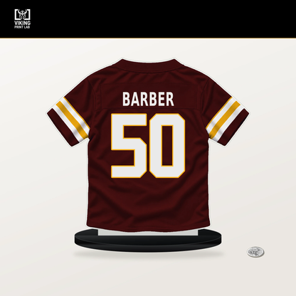 Ricky Barber number 50 Washington Commanders jersey stand with included black base.
