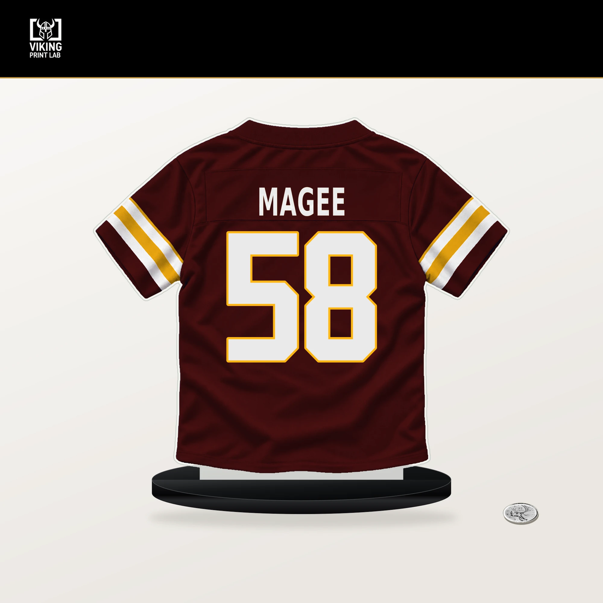 Jordan Magee number 58 Washington Commanders jersey stand with included black base.