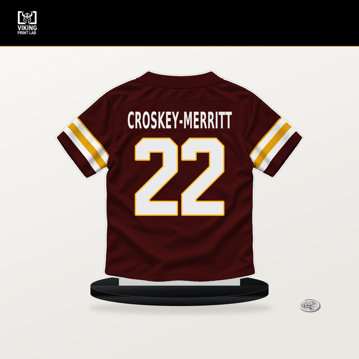 Jacory Croskey-Merritt number 22 Washington Commanders jersey stand with included black base.