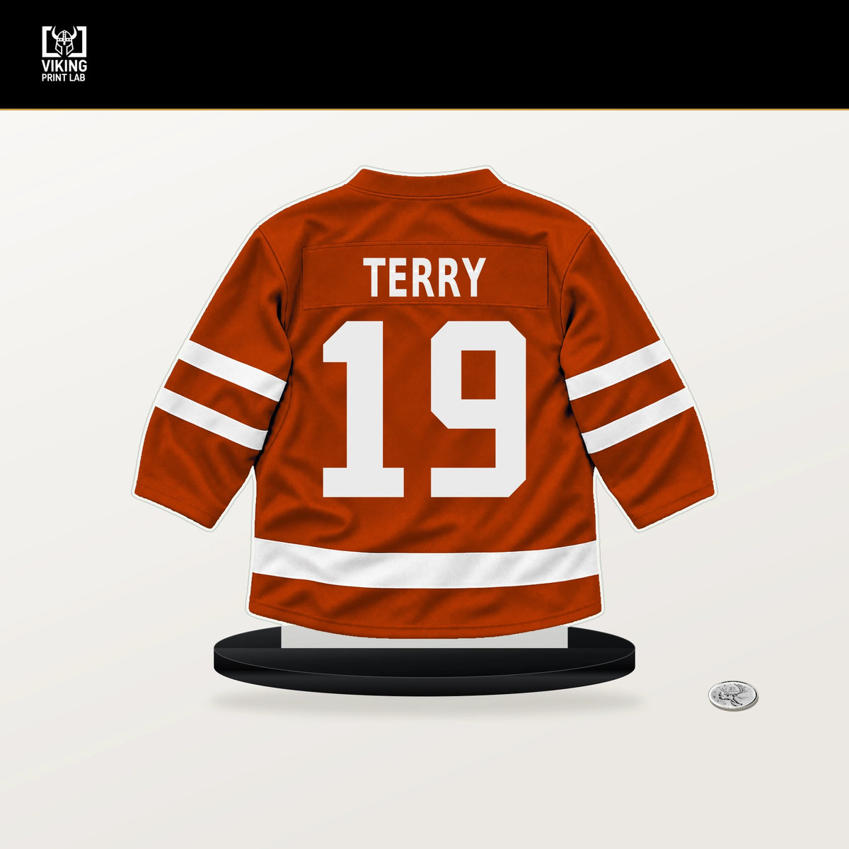 Troy Terry number 19 Anaheim Ducks jersey stand with included black base.