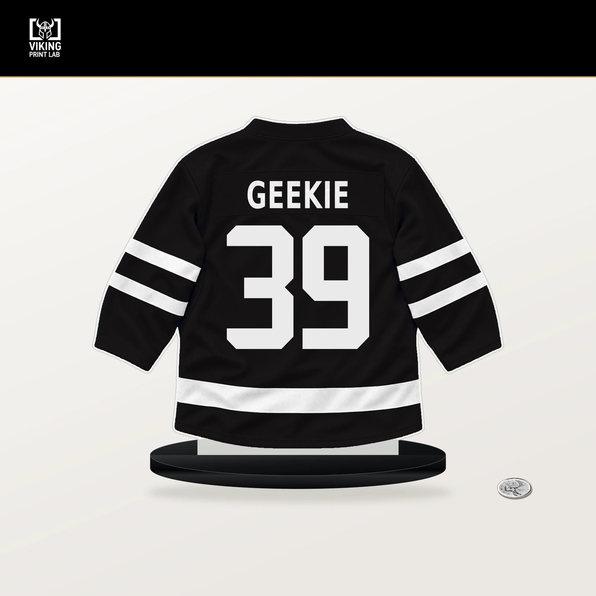 Morgan Geekie number 39 Boston Bruins jersey stand with included black base.