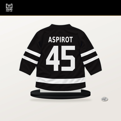 Jonathan Aspirot number 45 Boston Bruins jersey stand with included black base.