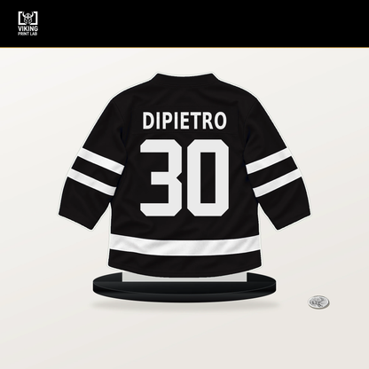 Michael DiPietro number 30 Boston Bruins jersey stand with included black base.