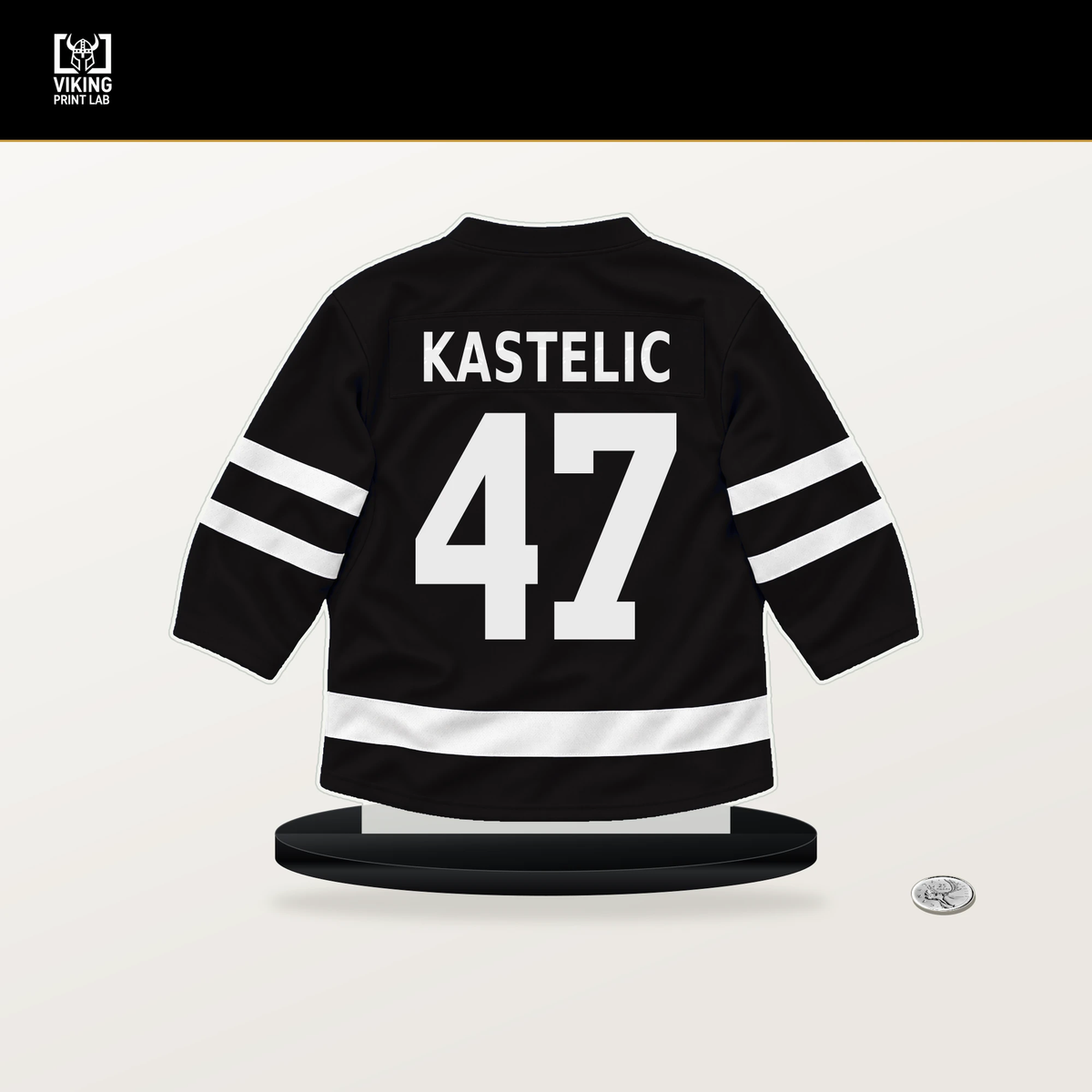 Mark Kastelic number 47 Boston Bruins jersey stand with included black base.