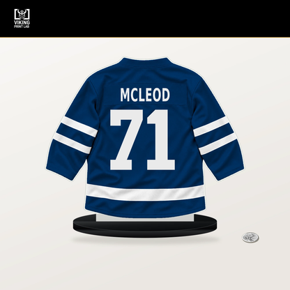 Ryan McLeod number 71 Buffalo Sabres jersey stand with included black base.