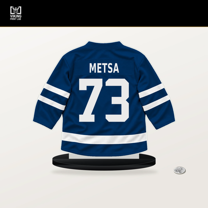 Zach Metsa number 73 Buffalo Sabres jersey stand with included black base.