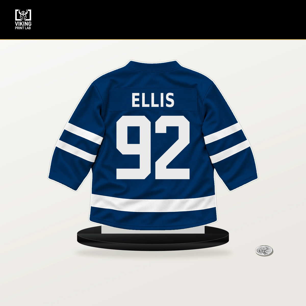 Colten Ellis number 92 Buffalo Sabres jersey stand with included black base.