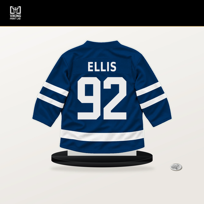 Colten Ellis number 92 Buffalo Sabres jersey stand with included black base.