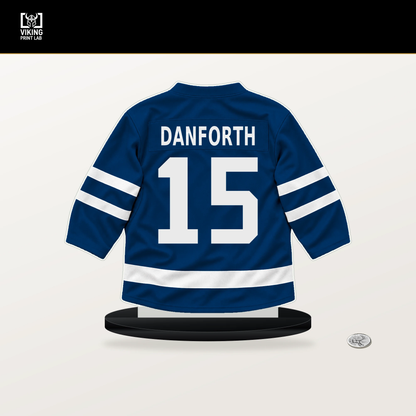 Justin Danforth number 15 Buffalo Sabres jersey stand with included black base.