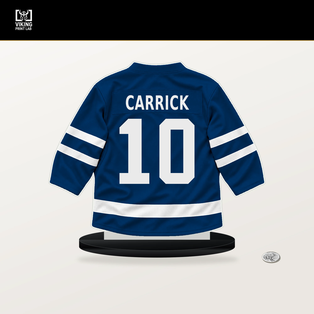 Sam Carrick number 10 Buffalo Sabres jersey stand with included black base.