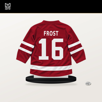 Morgan Frost number 16 Calgary Flames jersey stand with included black base.