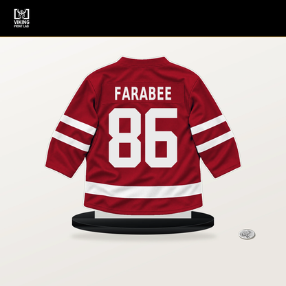 Joel Farabee number 86 Calgary Flames jersey stand with included black base.