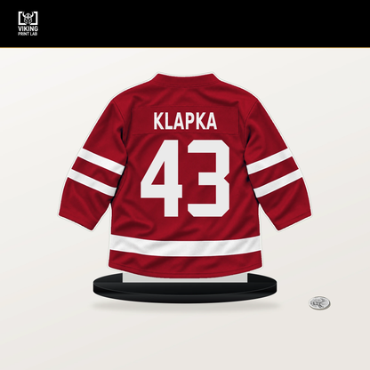 Adam Klapka number 43 Calgary Flames jersey stand with included black base.