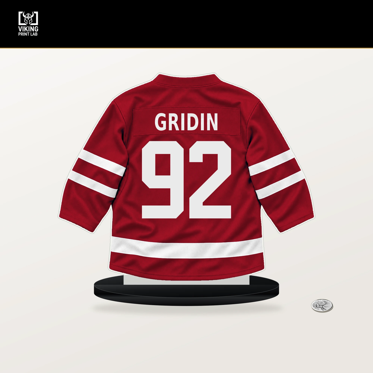 Matvei Gridin number 92 Calgary Flames jersey stand with included black base.
