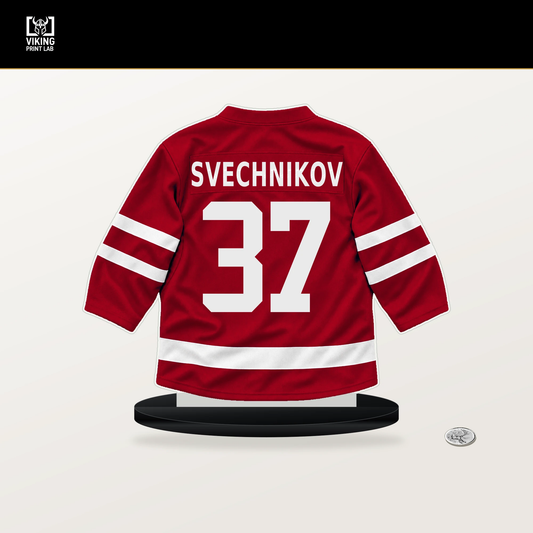 Andrei Svechnikov number 37 Carolina Hurricanes jersey stand with included black base.