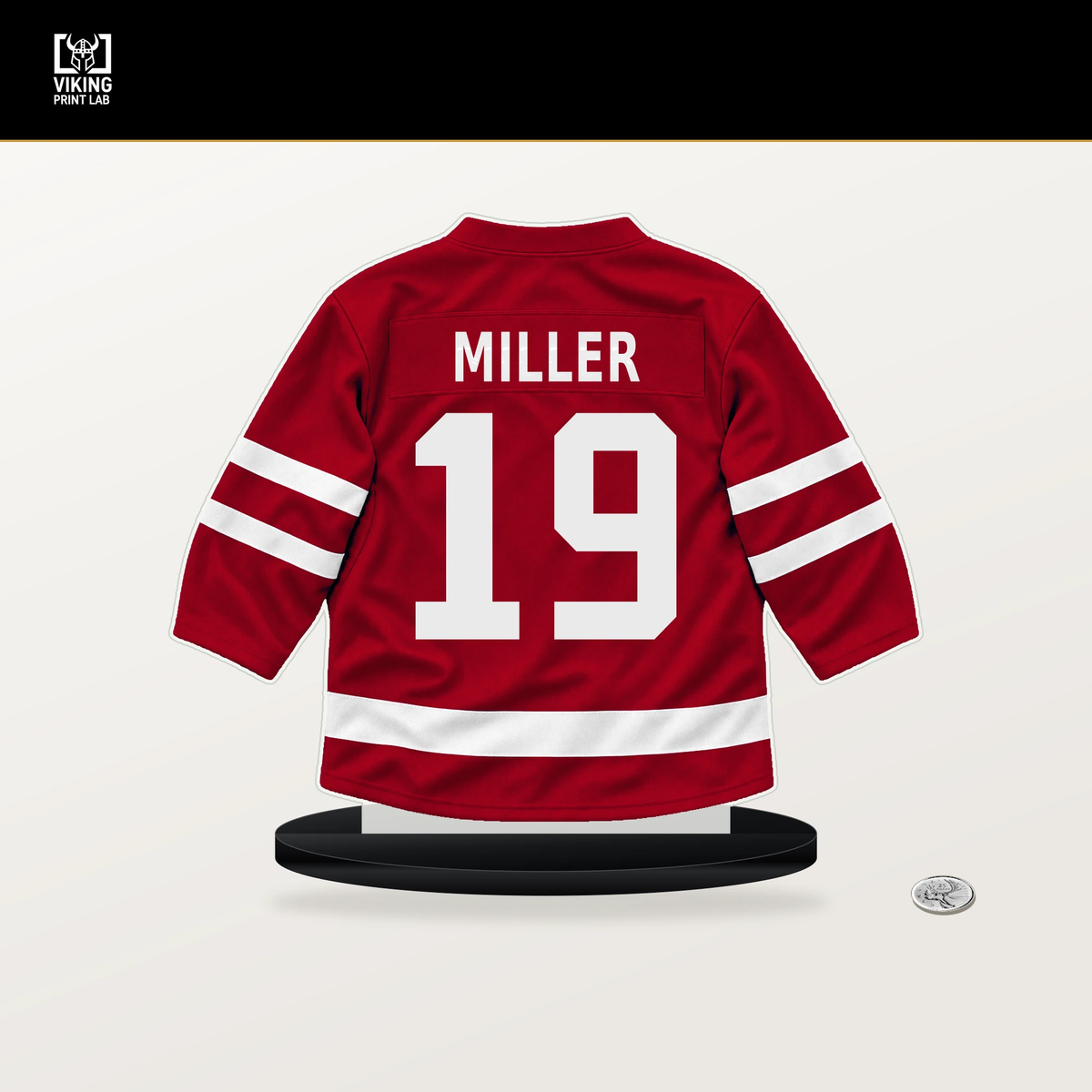 K'Andre Miller number 19 Carolina Hurricanes jersey stand with included black base.