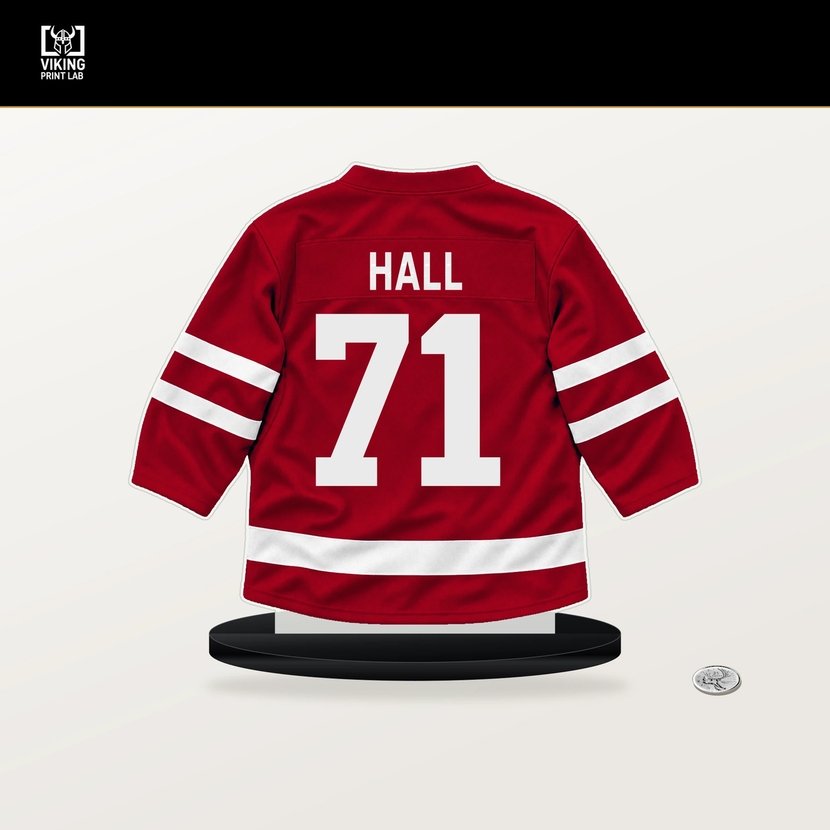 Taylor Hall number 71 Carolina Hurricanes jersey stand with included black base.