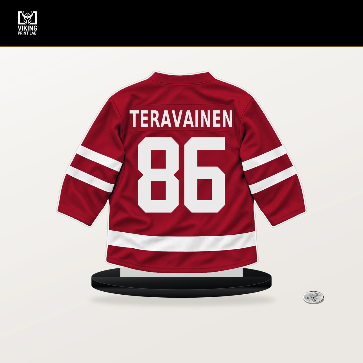 Teuvo Teravainen number 86 Chicago Blackhawks jersey stand with included black base.