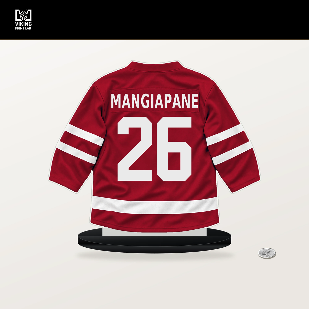 Andrew Mangiapane number 26 Chicago Blackhawks jersey stand with included black base.