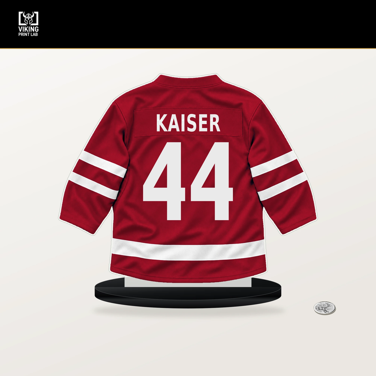 Wyatt Kaiser number 44 Chicago Blackhawks jersey stand with included black base.
