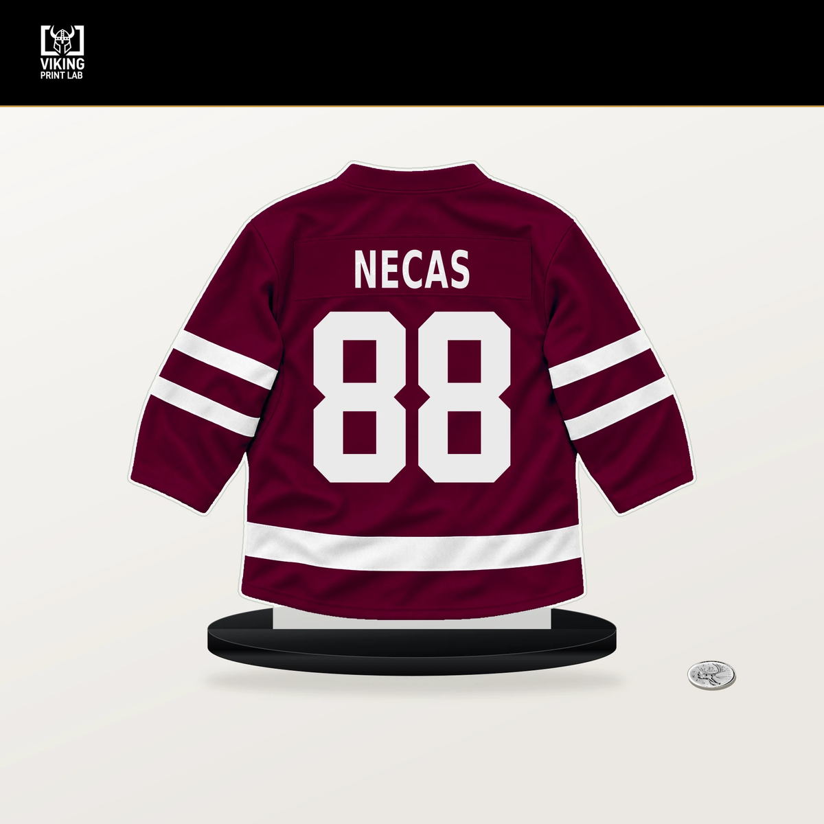 Martin Necas number 88 Colorado Avalanche jersey stand with included black base.