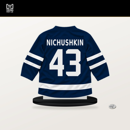 Valeri Nichushkin number 43 Columbus Blue Jackets jersey stand with included black base.