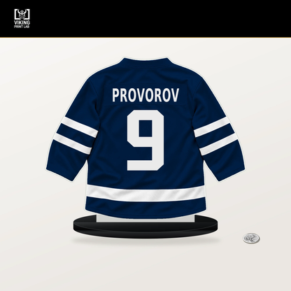 Ivan Provorov number 9 Columbus Blue Jackets jersey stand with included black base.