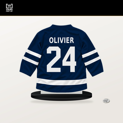 Mathieu Olivier number 24 Columbus Blue Jackets jersey stand with included black base.