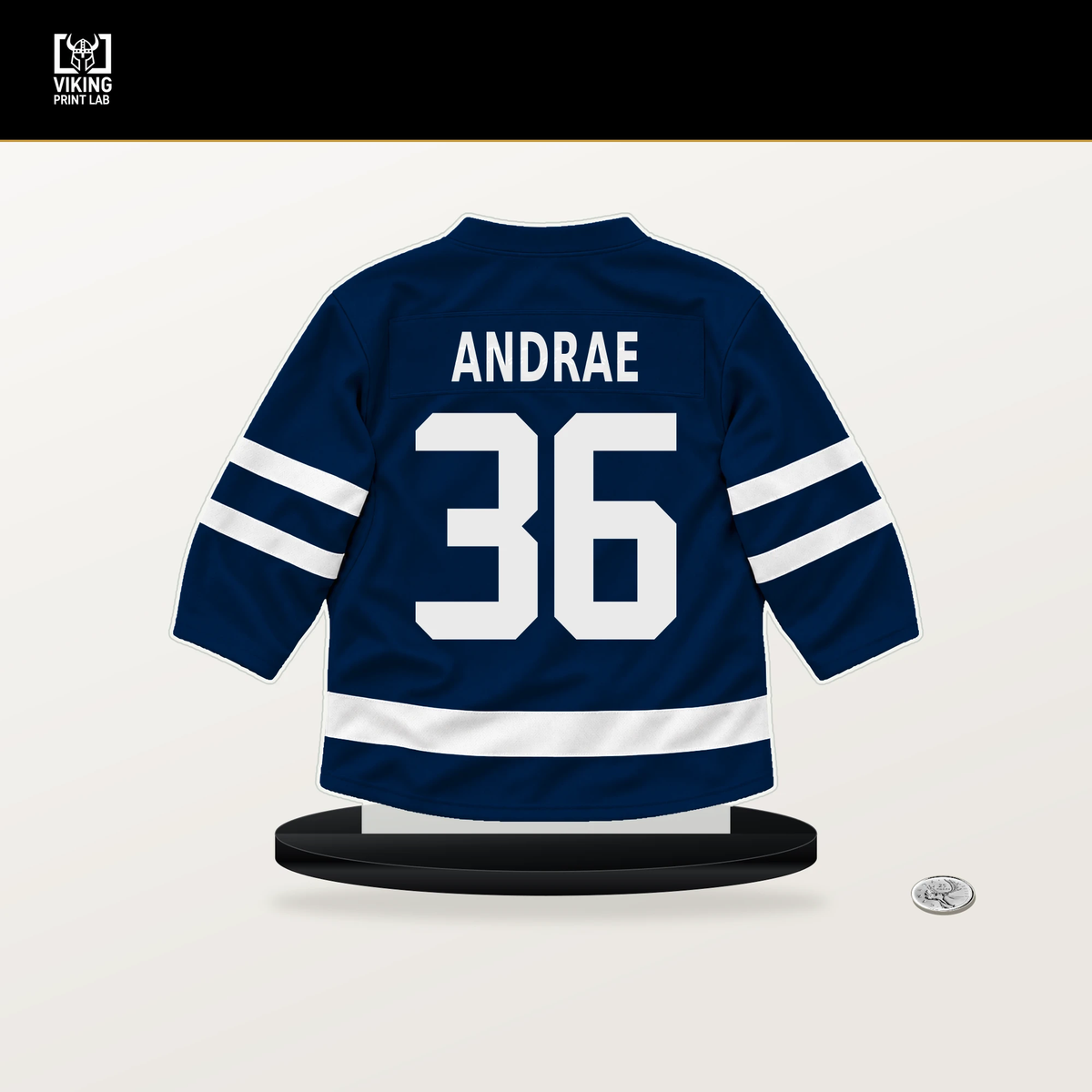 Emil Andrae number 36 Columbus Blue Jackets jersey stand with included black base.