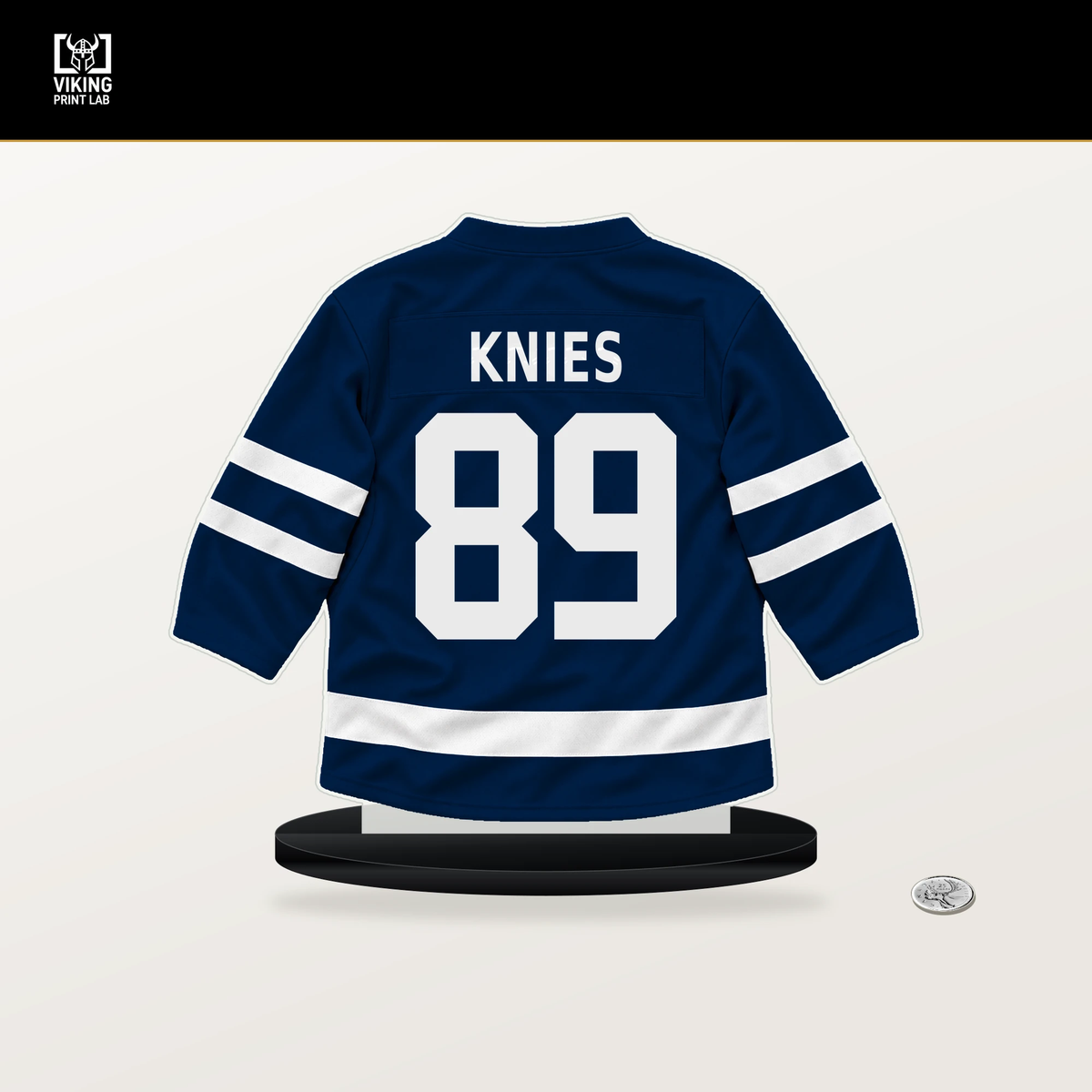 Matthew Knies number 89 Columbus Blue Jackets jersey stand with included black base.