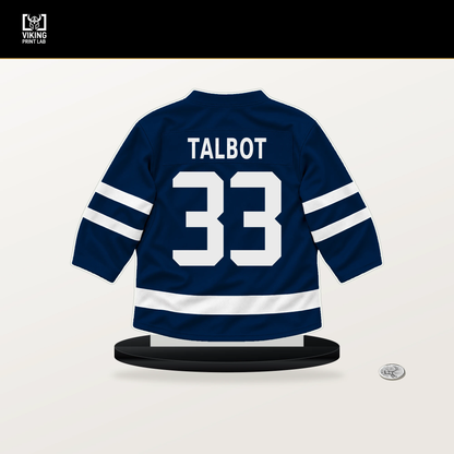 Cam Talbot number 33 Columbus Blue Jackets jersey stand with included black base.