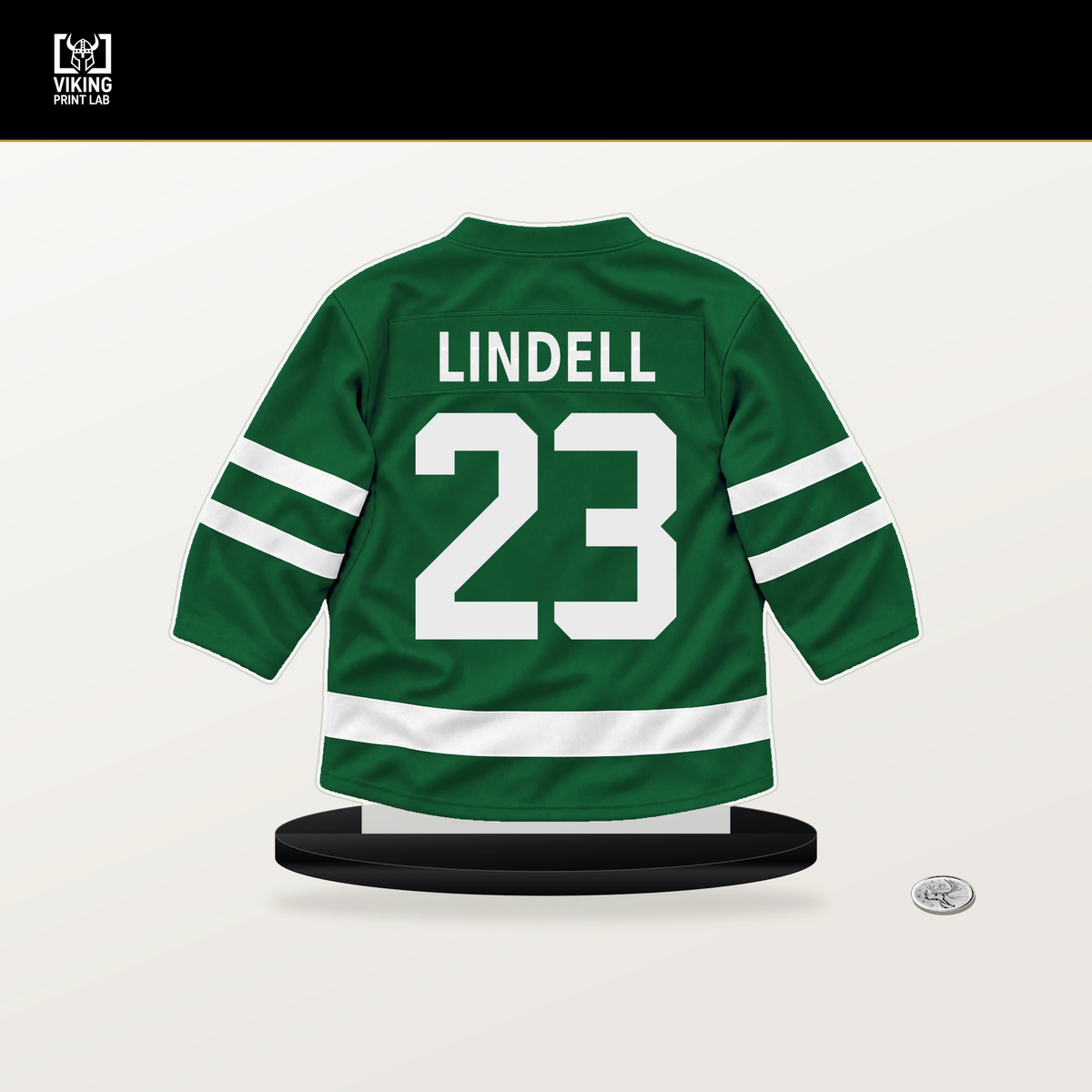 Esa Lindell number 23 Dallas Stars jersey stand with included black base.