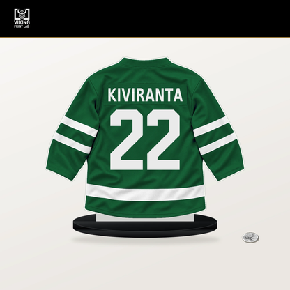 Joel Kiviranta number 22 Dallas Stars jersey stand with included black base.