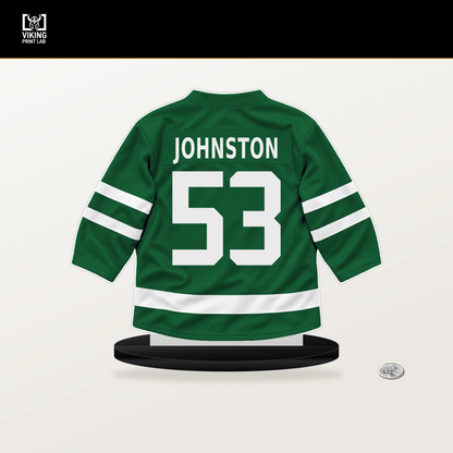 Wyatt Johnston number 53 Dallas Stars jersey stand with included black base.